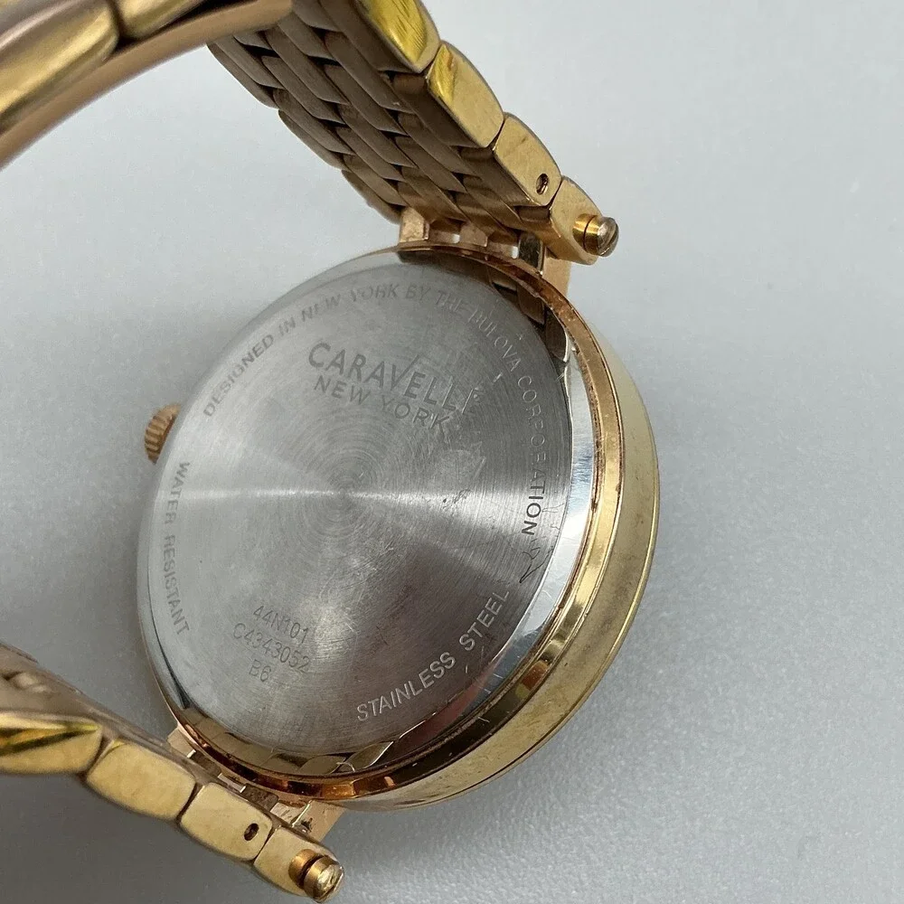 Caravelle New York Womens Watch 38mm MOP Gold Tone Day Date New Battery 5.75